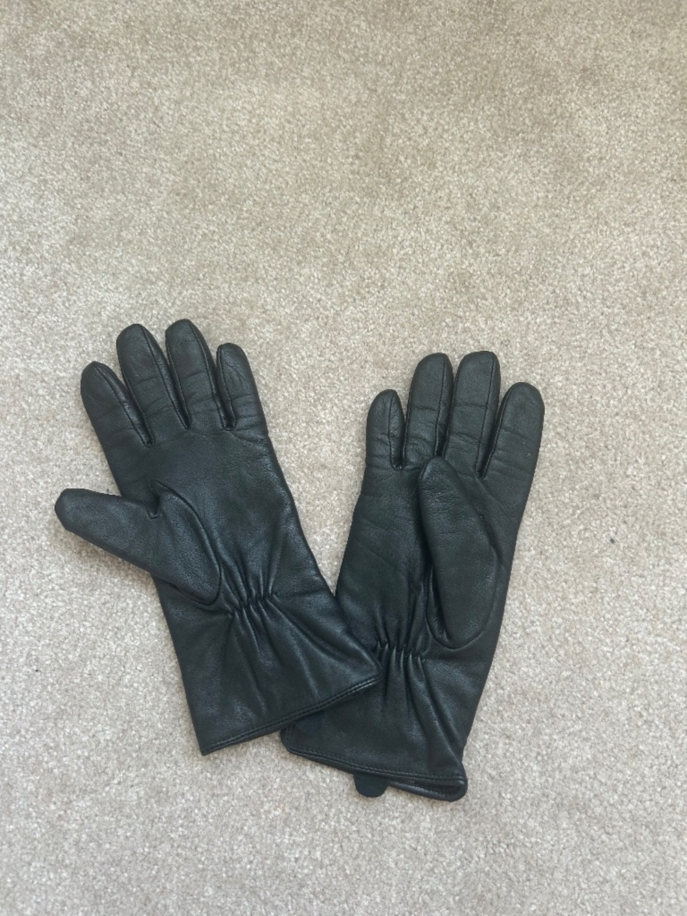 Black leather gloves